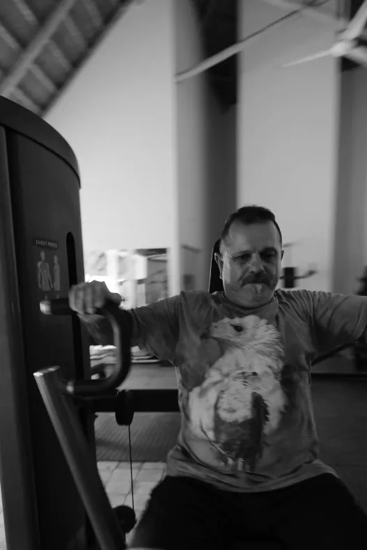 Member on the chest press machine at Tunya Fit